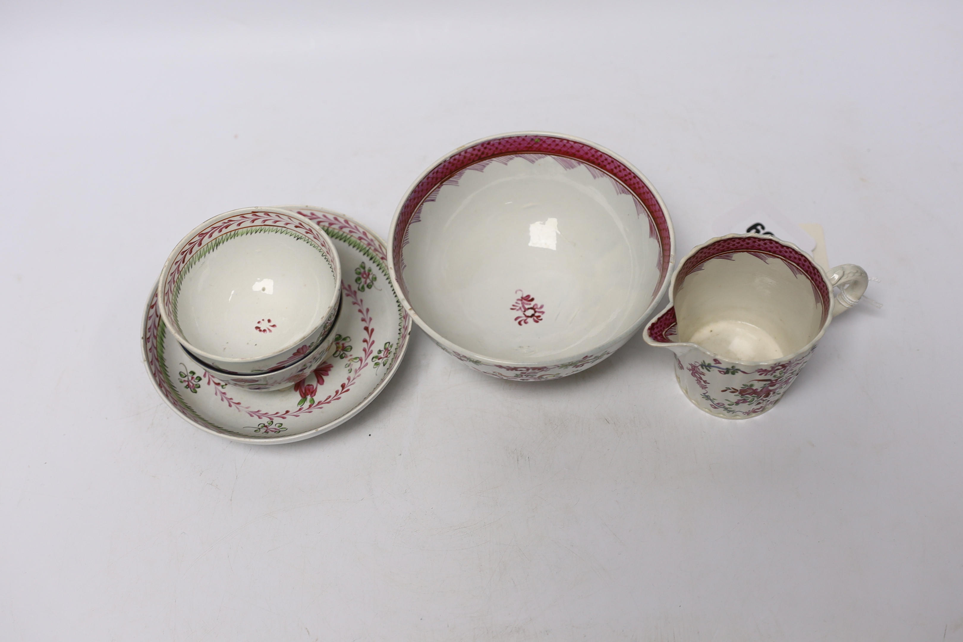 Late 18th/early 19th century pearlware small jug, sugar bowl and a cream jug, 6.5cm high and a late 18th century Chinese export teabowl